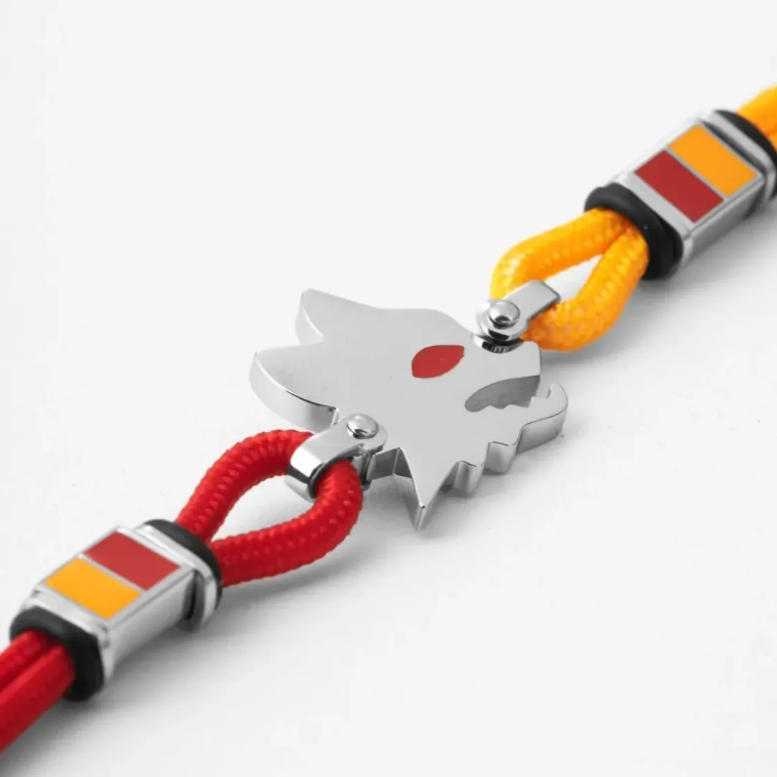 New Bracelet with central plaque Lupetto in hypoallergenic steel and adjustable fabric cord red and yellow Jewellery